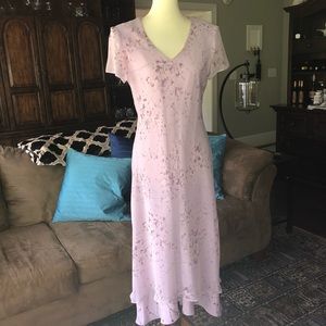 Lavender pink tea-length dress.